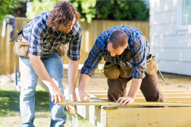 Two Workers Building a Deck