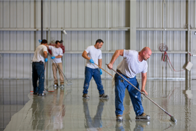 Workers adding Epoxy Flooring