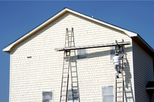 Exterior Painter On a Ladder