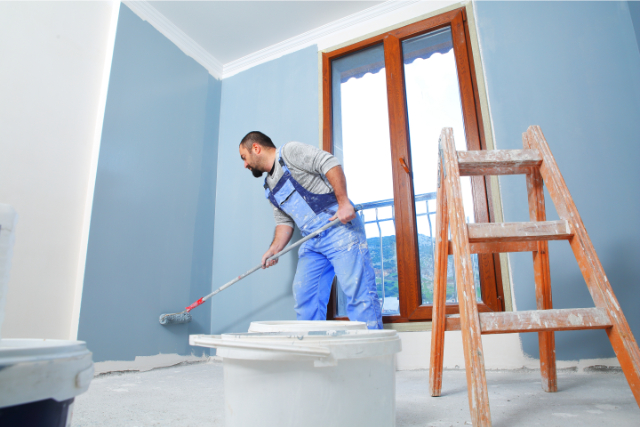 House Painter with a roller and a ladder